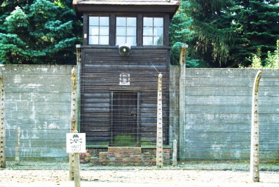 2 rows of barbed wire fences charged with high voltage electricity.  Some prisoners suicided on these fences.