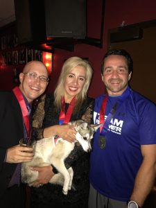 Marathoners and a puppy in a bar... doesn't get much better (or stranger) than this!